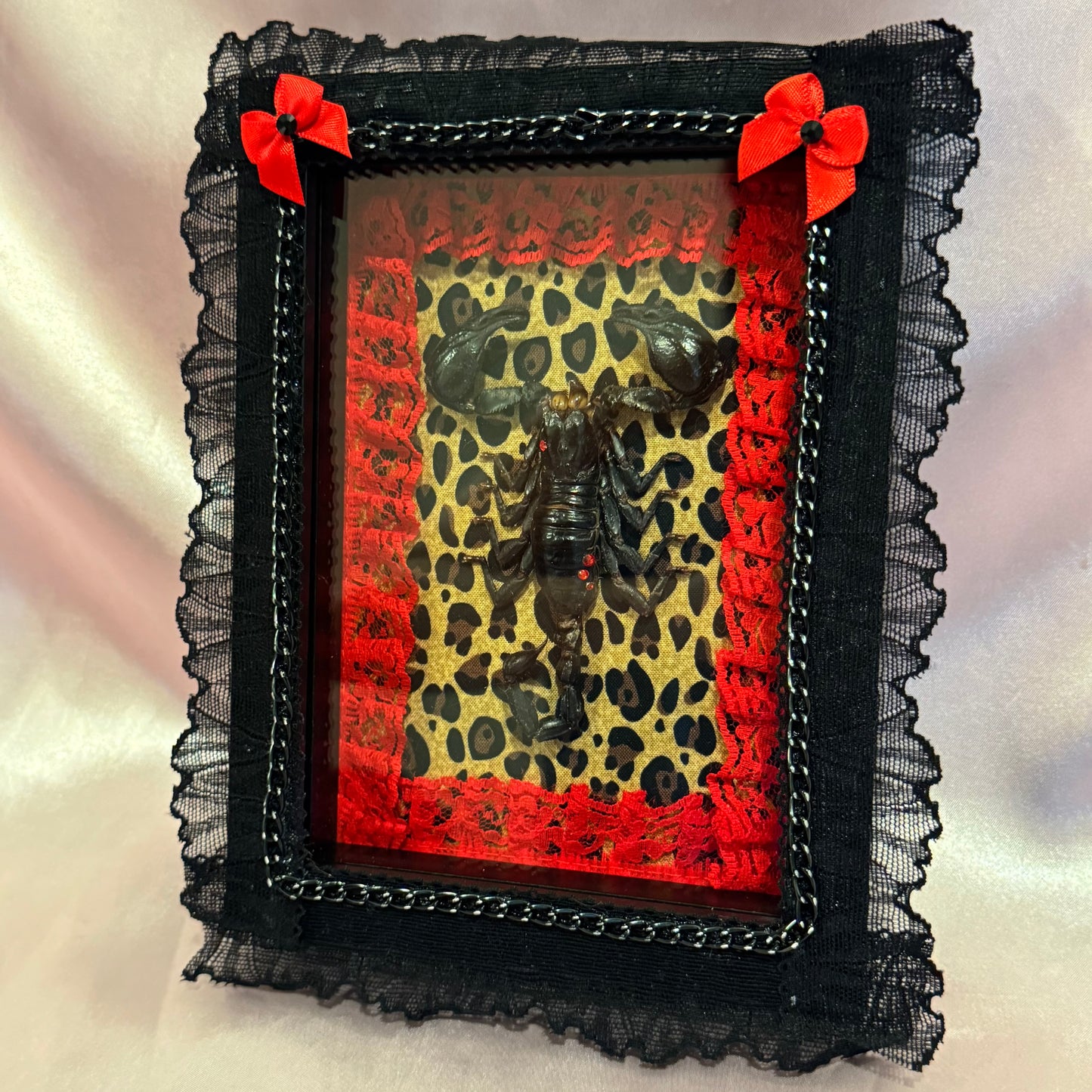 Scorpion on Cheetah Print